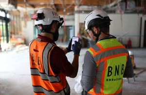 BNBuilders workers on an active jobsite using HammerTech Construction Safety Software for safety