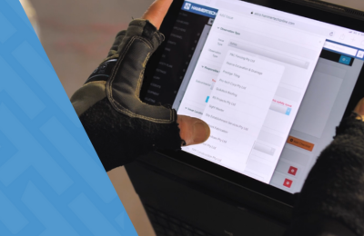 Integrated construction safety platform on a tablet being used on construction site for safety.
